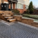 block paving with timber wall and stairs installed in Warwick